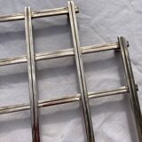 Stretch trivets in silver metal, geometric shapes