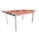 Vintage wooden dining table with chrome frame.