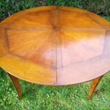 Directoire style round table with extensions