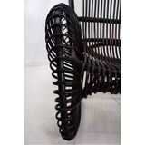 Rattan armchair and matching footstool