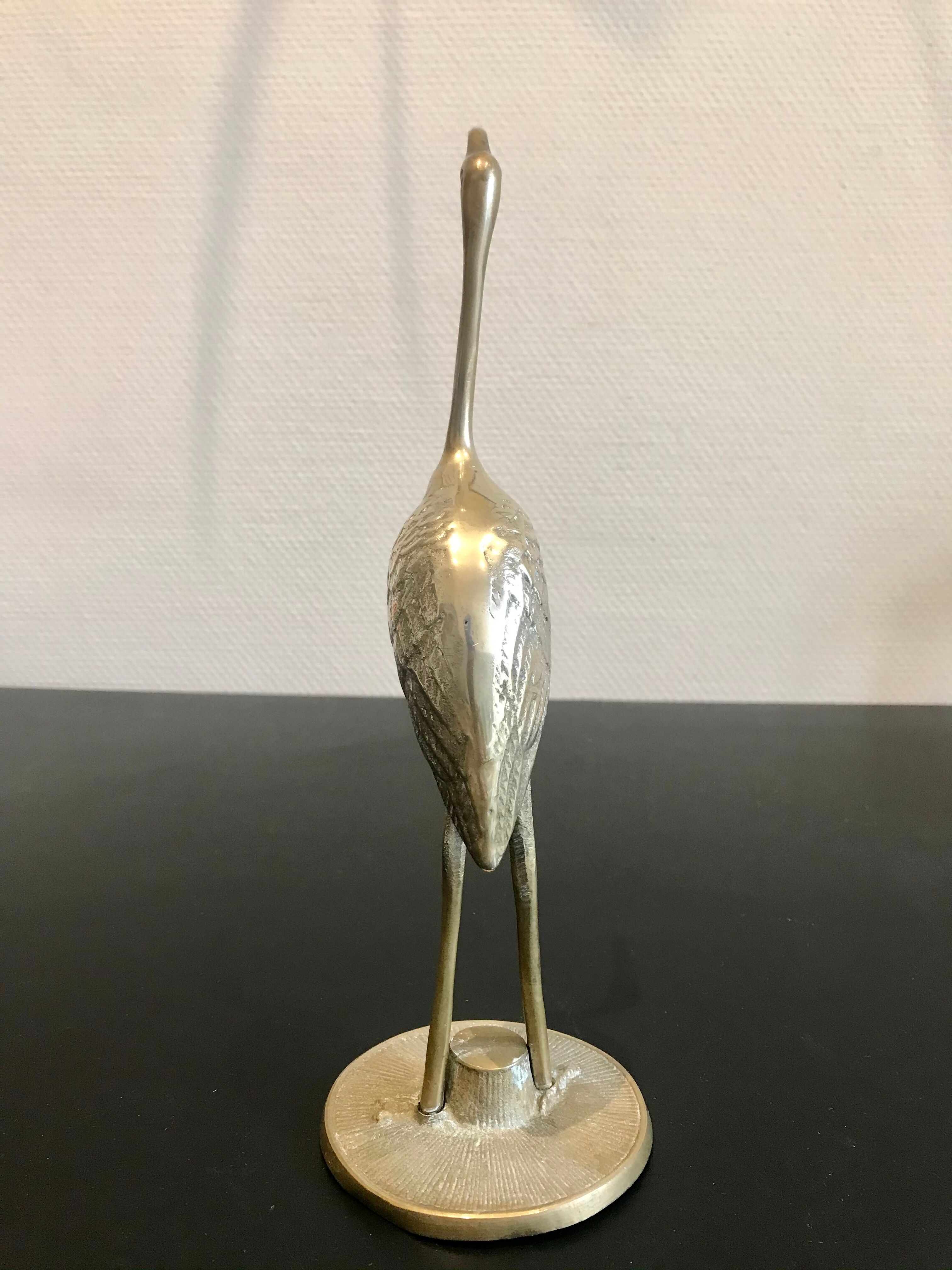 Couple of brass birds