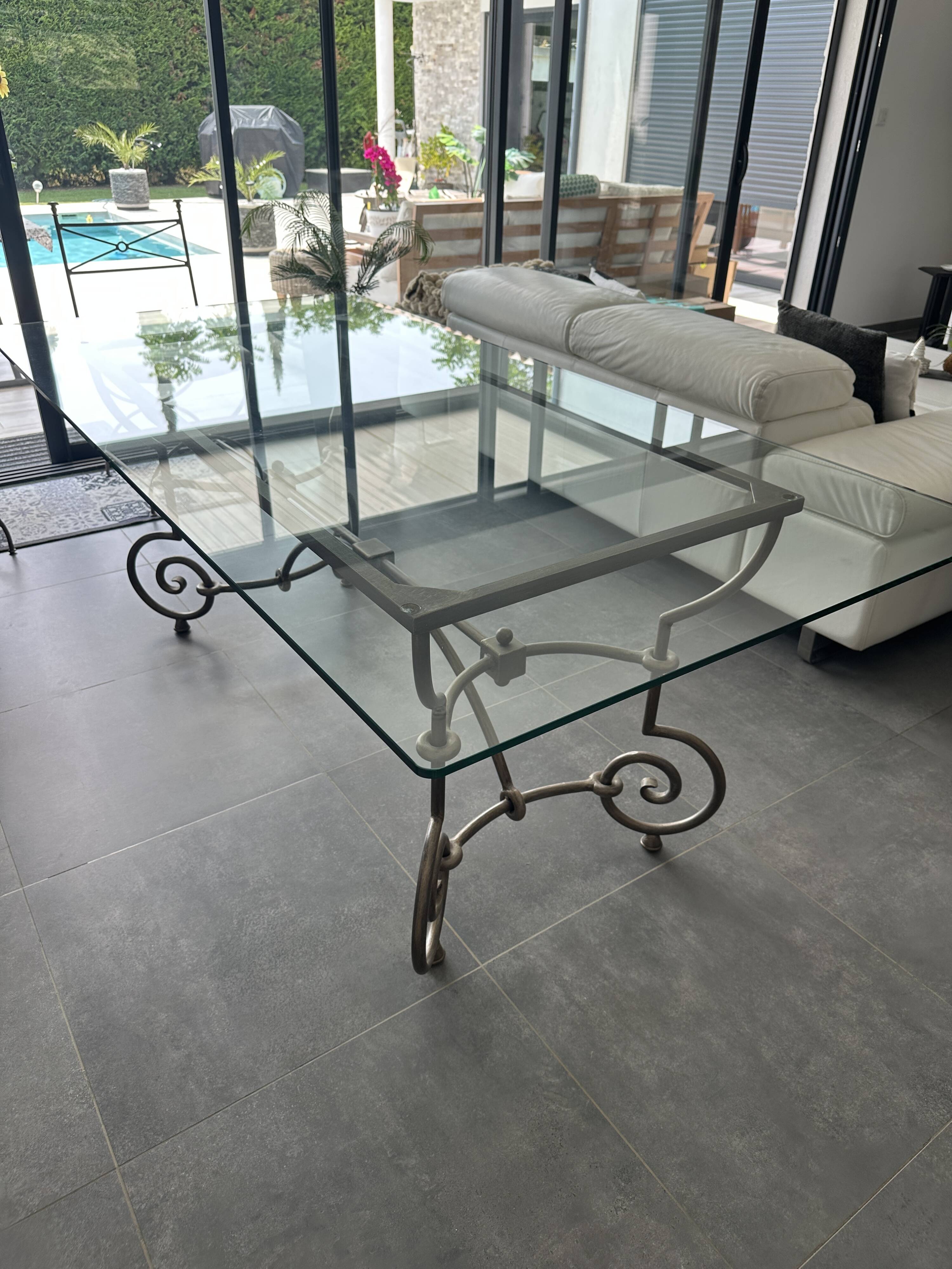 Roche Bobois glass and steel dining table and 6 chairs