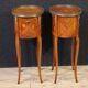 Pair of oval bedside tables in marquetry from the 20th century.