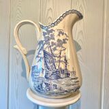 Old Longchamp iron earth pitcher
