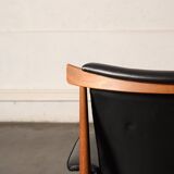 Finished Juhl armchair and its ottoman.