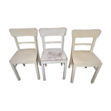3 white chairs
