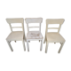 3 white chairs