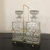 Pair of vintage decanters with brass basket