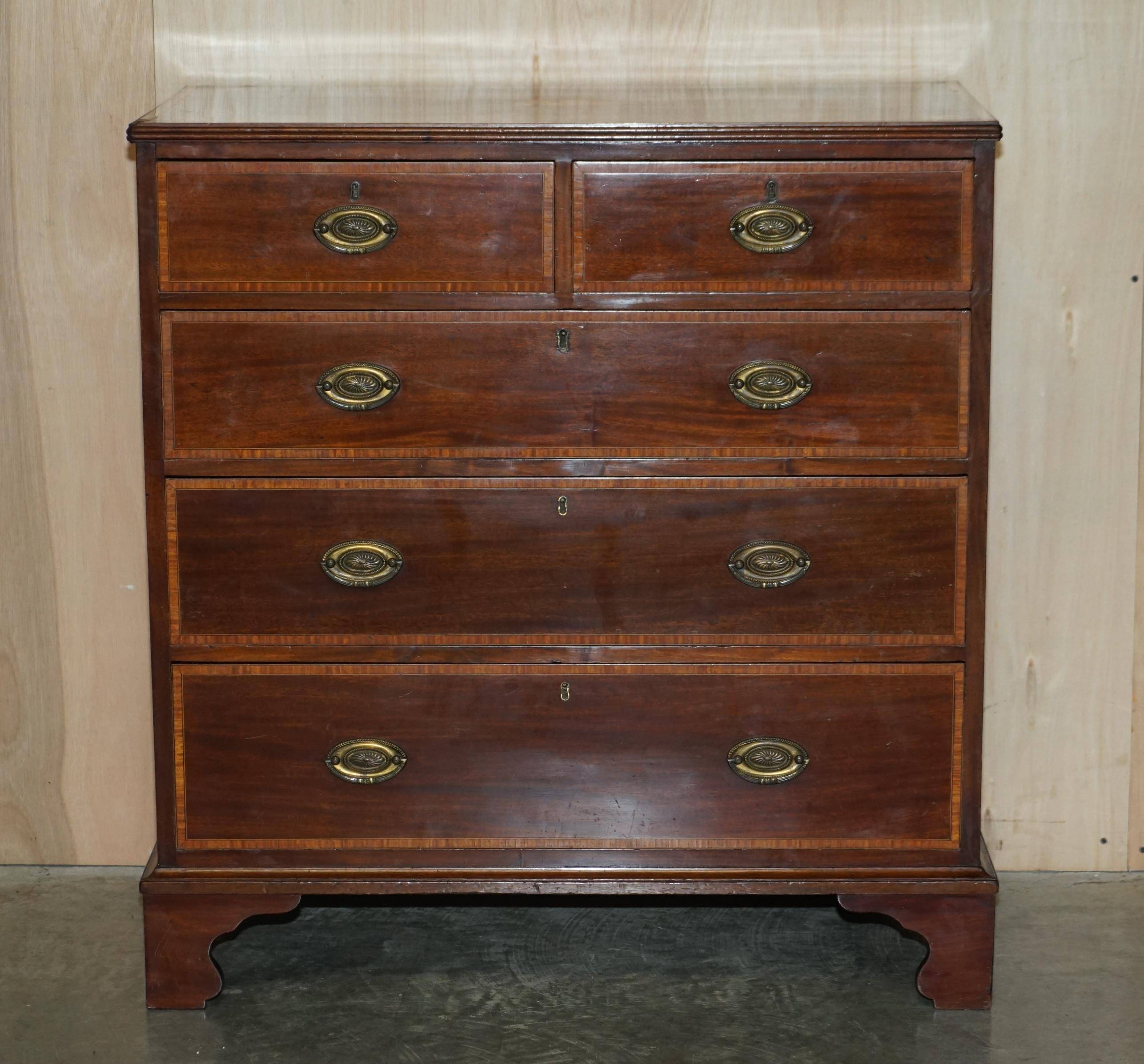 Antique Sheraton style commode by F. Thomas in hardwood and satinwood.