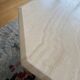 Table octogonale en travertin 130 cm Artelano état neuf