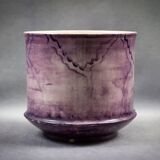 Slip planter with floral decoration