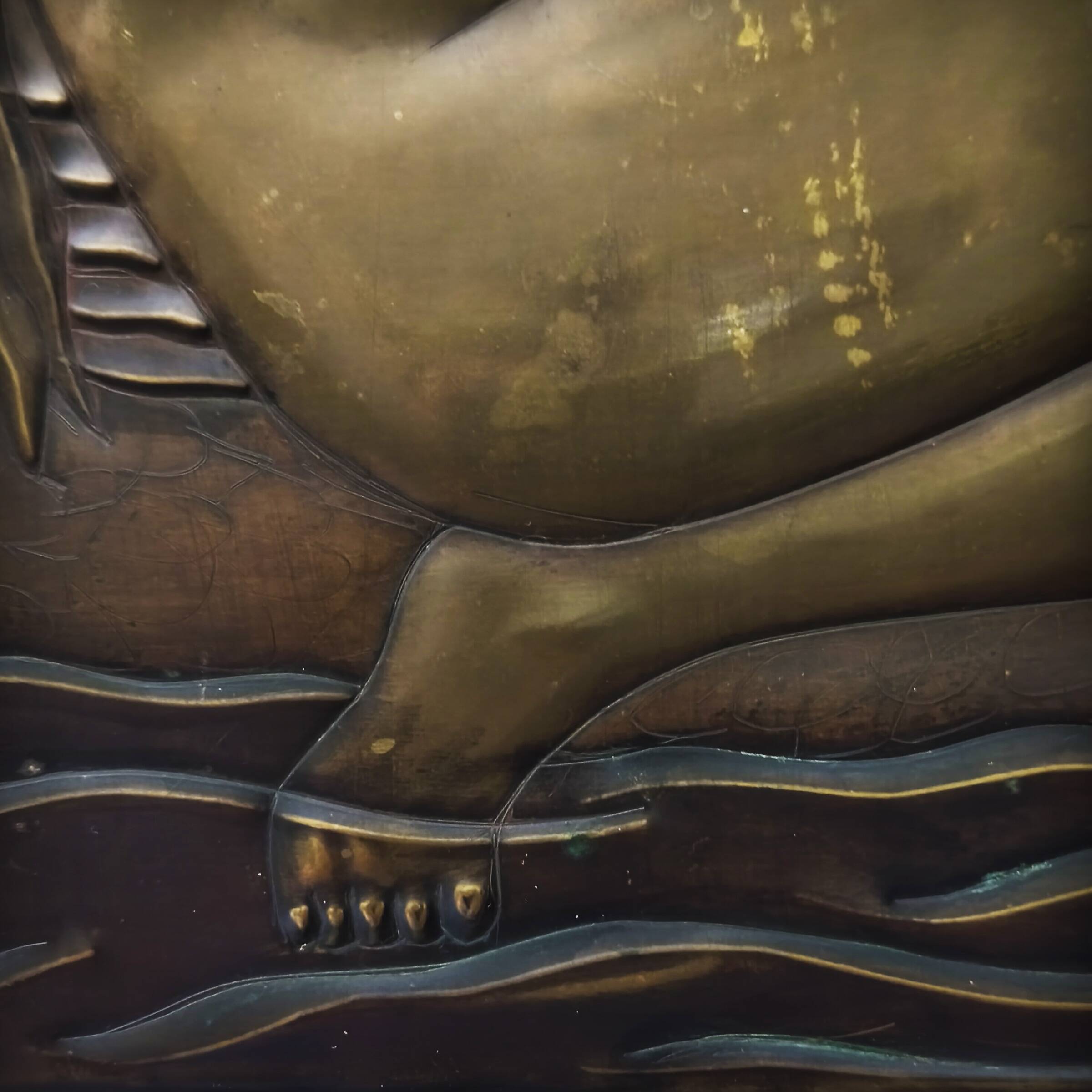 Brass table featuring a woman and a dolphin, France, 1960s.