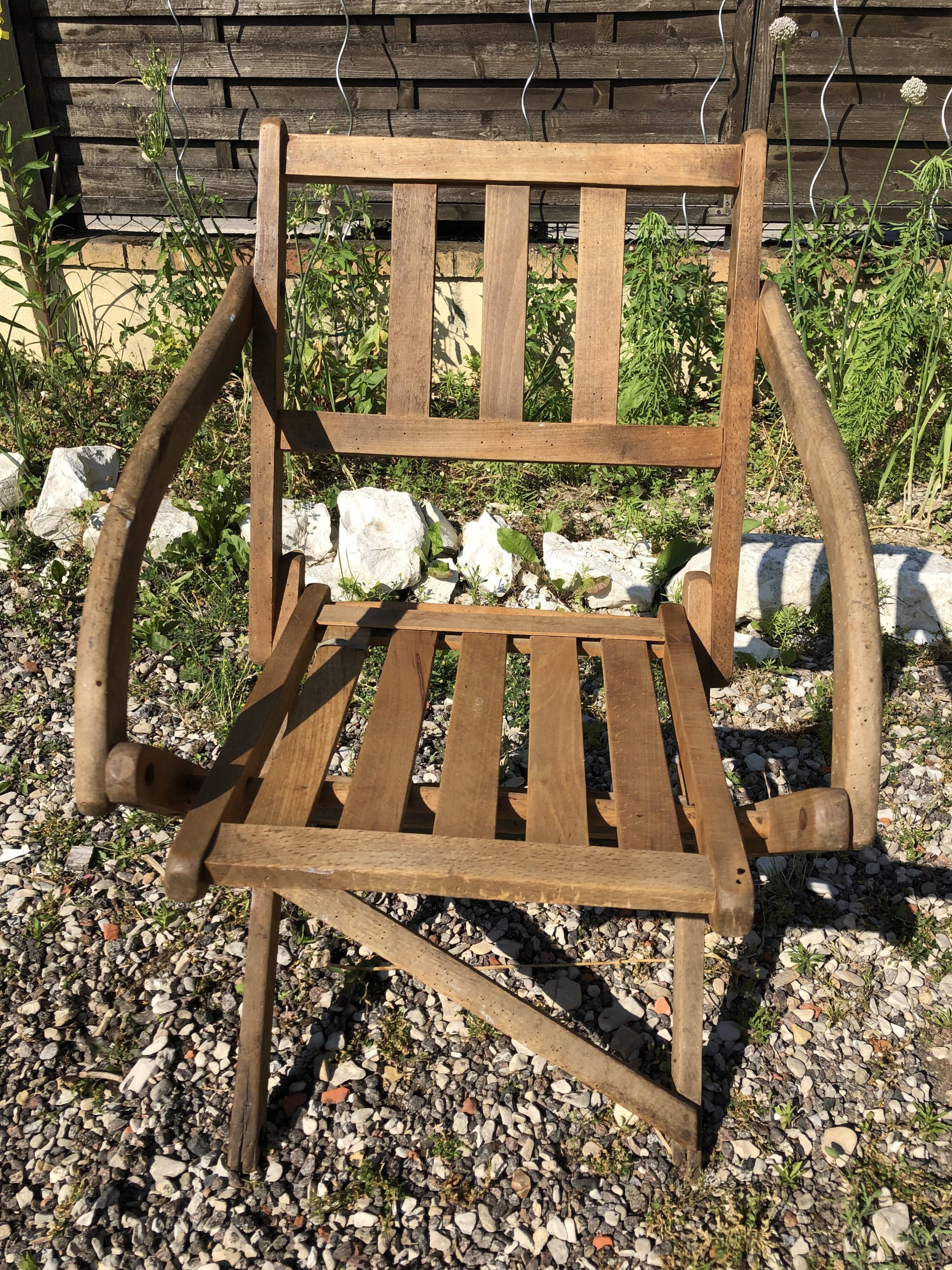 Old folding armchair wooden sitting vintage