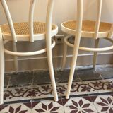 Couple of white bistro chairs