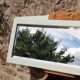 Miroir Art déco daté 1928 en bois massif – glace biseautée – 128 cm