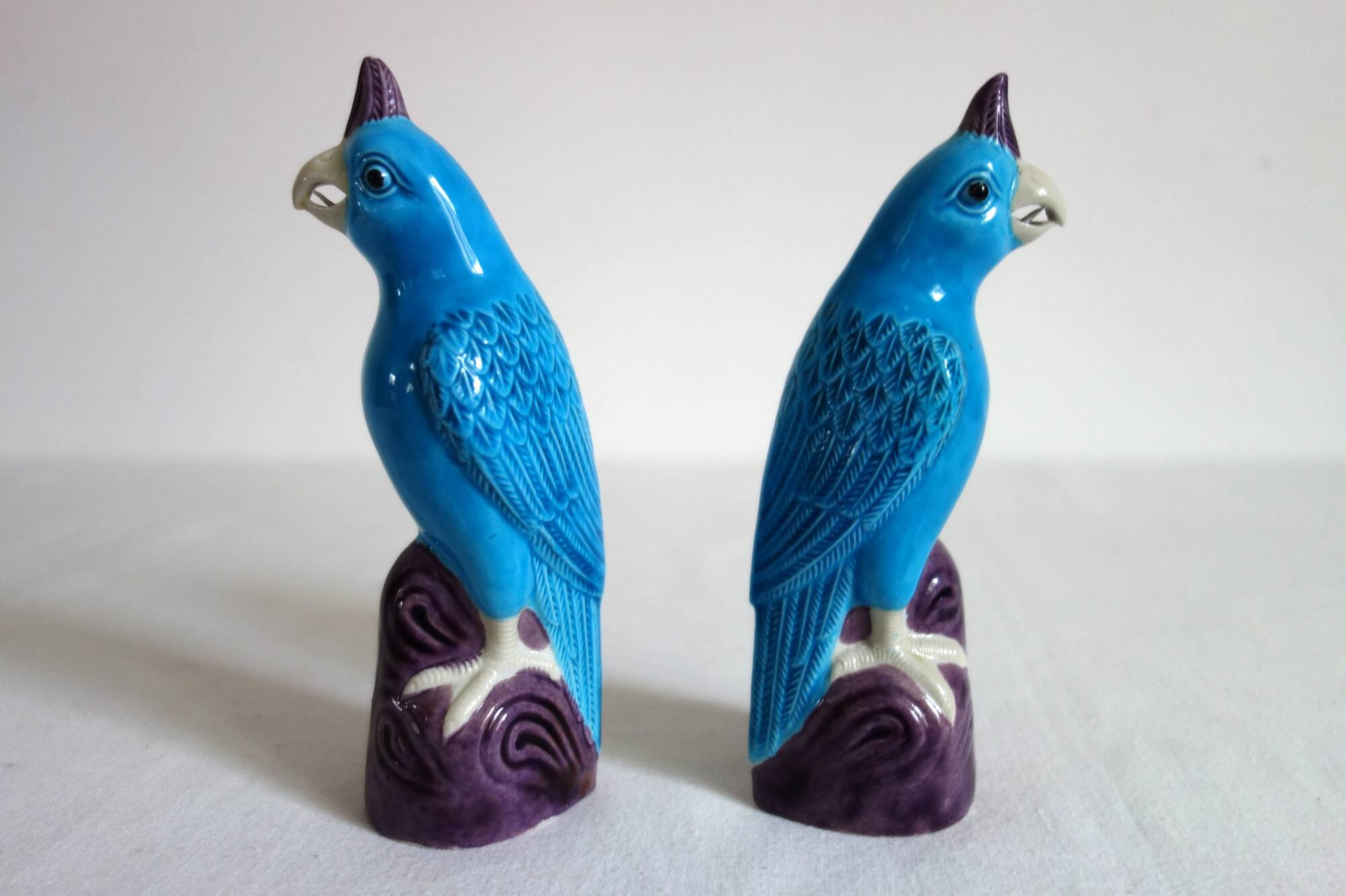 Pair of enamelled porcelain parrots, Chinese, 1960s.