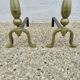 Pair of Neo-classical andirons, in solid bronze, 1920s-1930s.