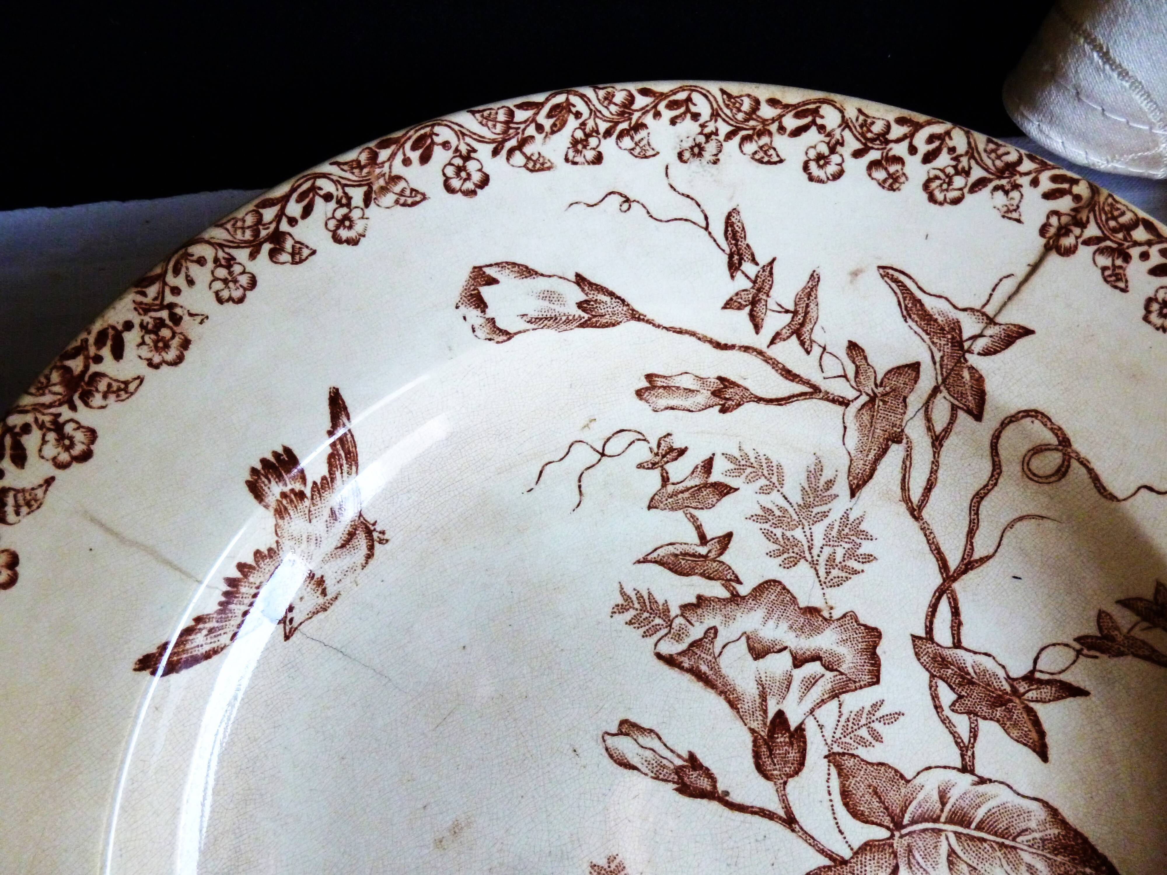 Antique deep plates from the late 19th century, old French crockery.