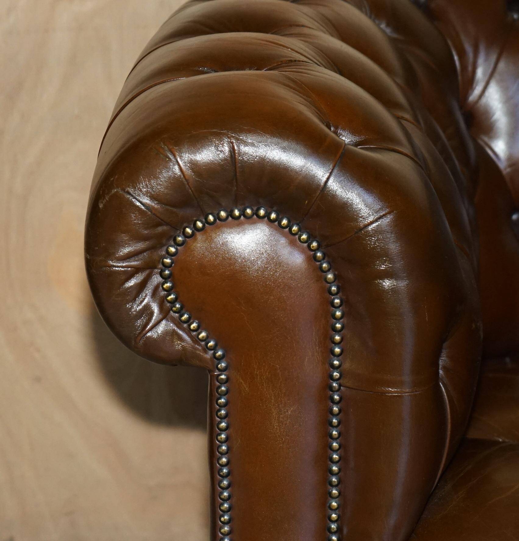 Restored Chesterfield leather sofa in vintage Art Deco style