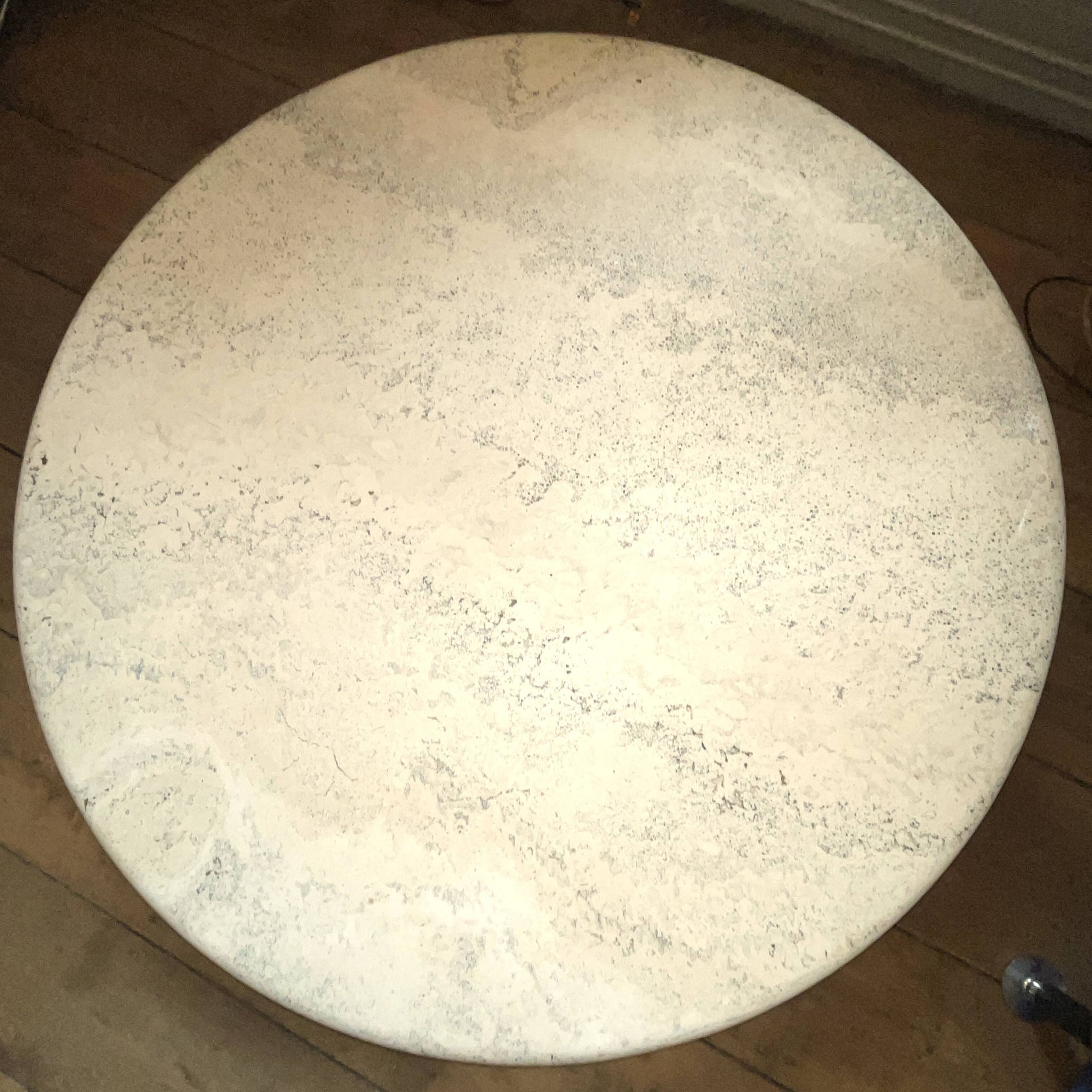 Round travertine coffee table, attributed to Angelo Mangiarotti, central cylindrical leg, 1970s