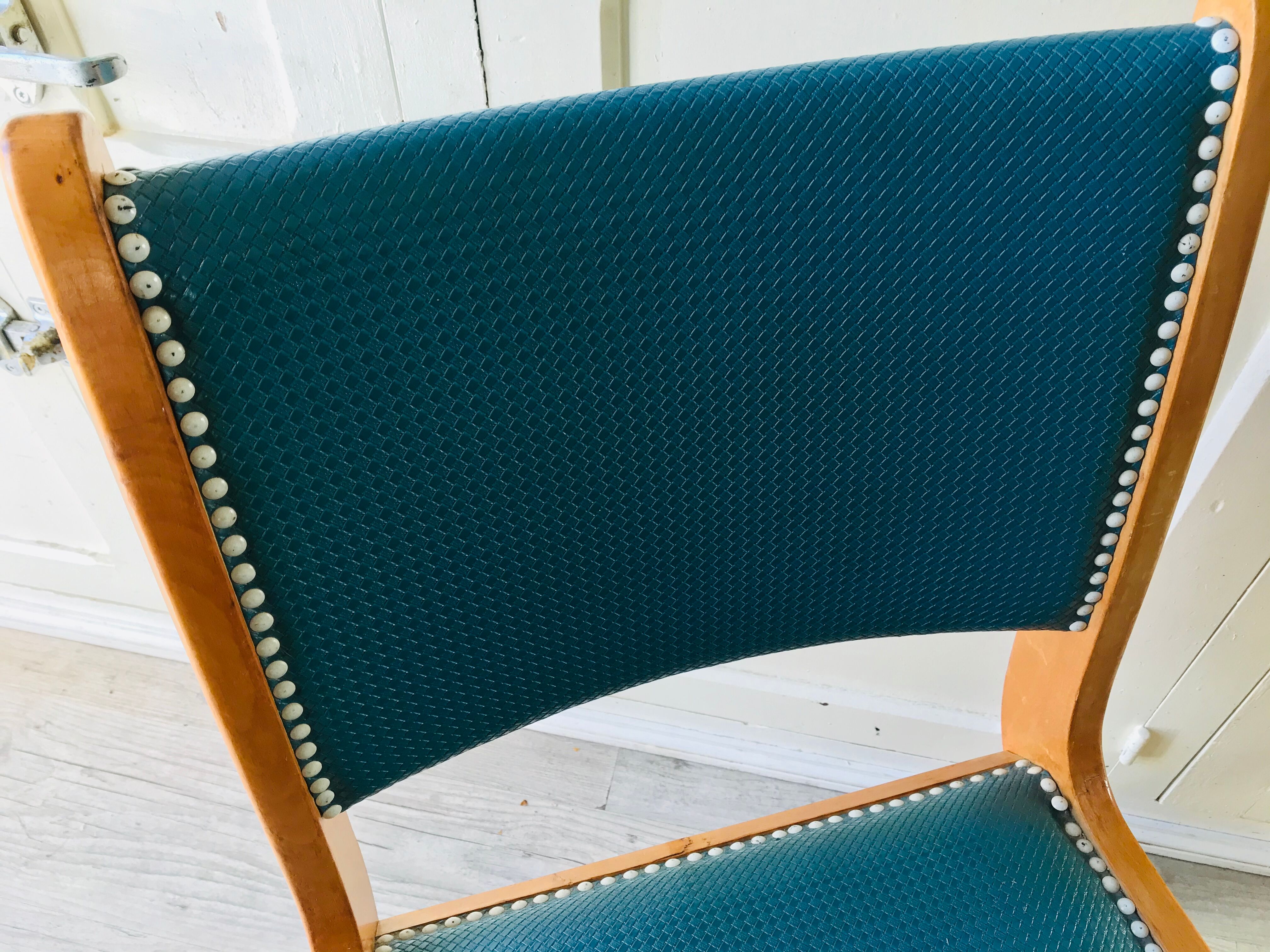 Vintage compass foot chair and studded blue skai