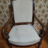 A pair of Empire period armchairs.