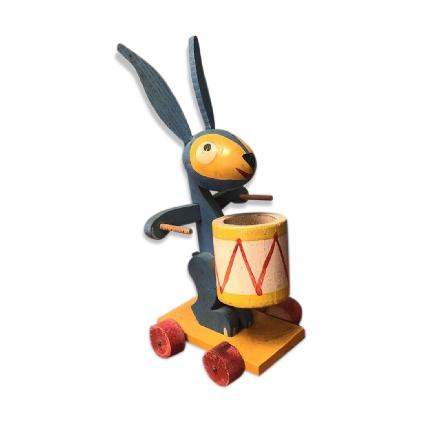 Old wooden wheeled rabbit toy
