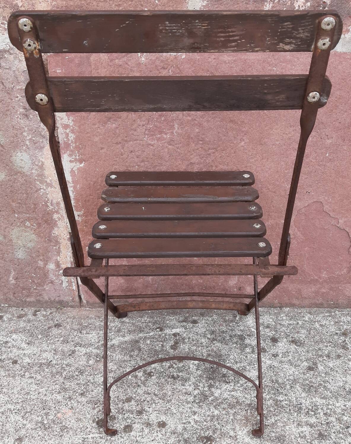 Foldable wrought iron chair