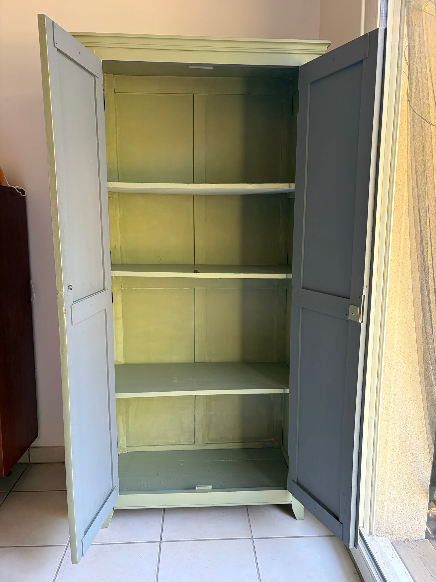 Antique Parisian wardrobe in sage green patina