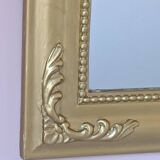 Gilded mirror with a Louis Philippe style pediment
