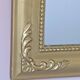 Miroir doré a fronton style Louis Philippe