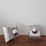 Pair of space age stainless steel wall lights