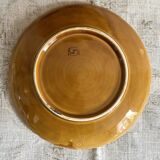 Round dish in barbotine with sarregumine fruit decoration
