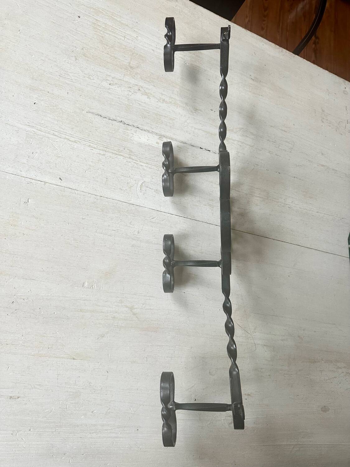Old wrought iron coat rack