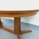 Vintage oval dining table Baumann from the 60s and 70s in teak with extension.