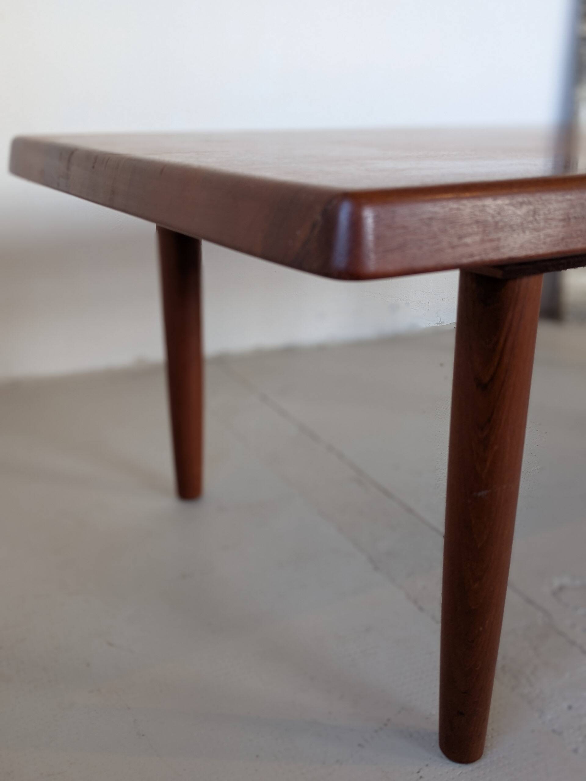 Large solid teak table, design by Niels Bach, origin Denmark.