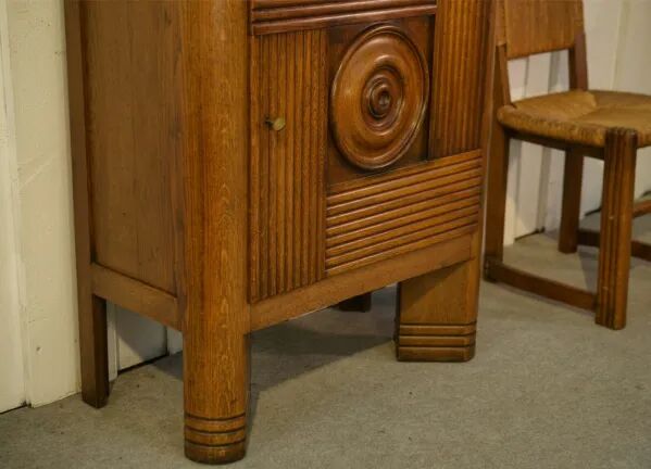 Solid oak display cabinet in the style of Charles Dudouyt, 1950s