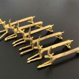 6 brass antelope-shaped knife holders