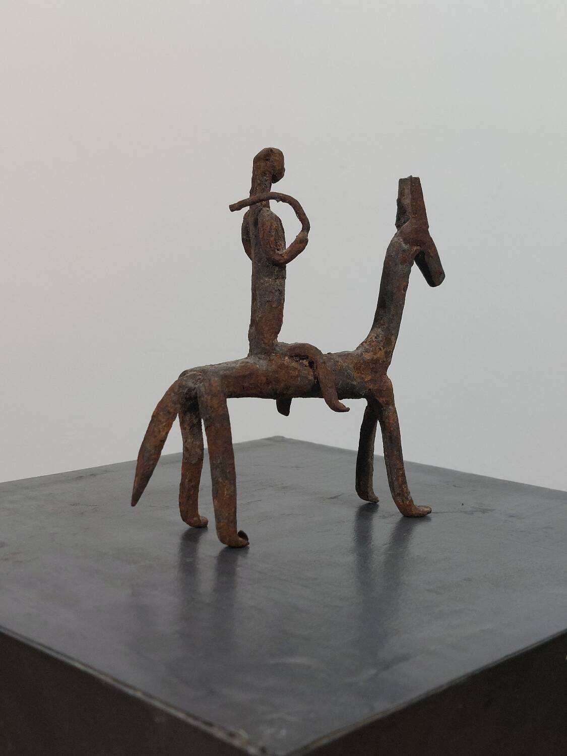 Hand-forged Dogon tribal figurine from naive East Africa.