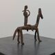 Hand-forged Dogon tribal figurine from naive East Africa.