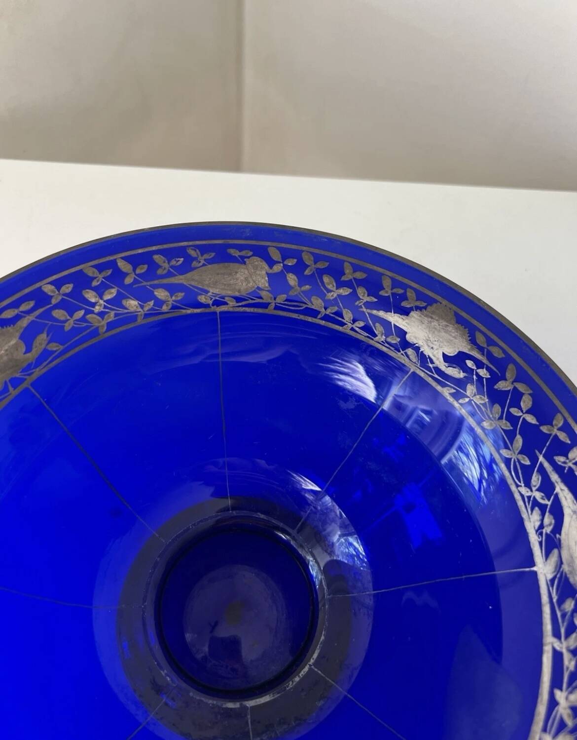 Cobalt blue glass bowl with Art Deco bird decor