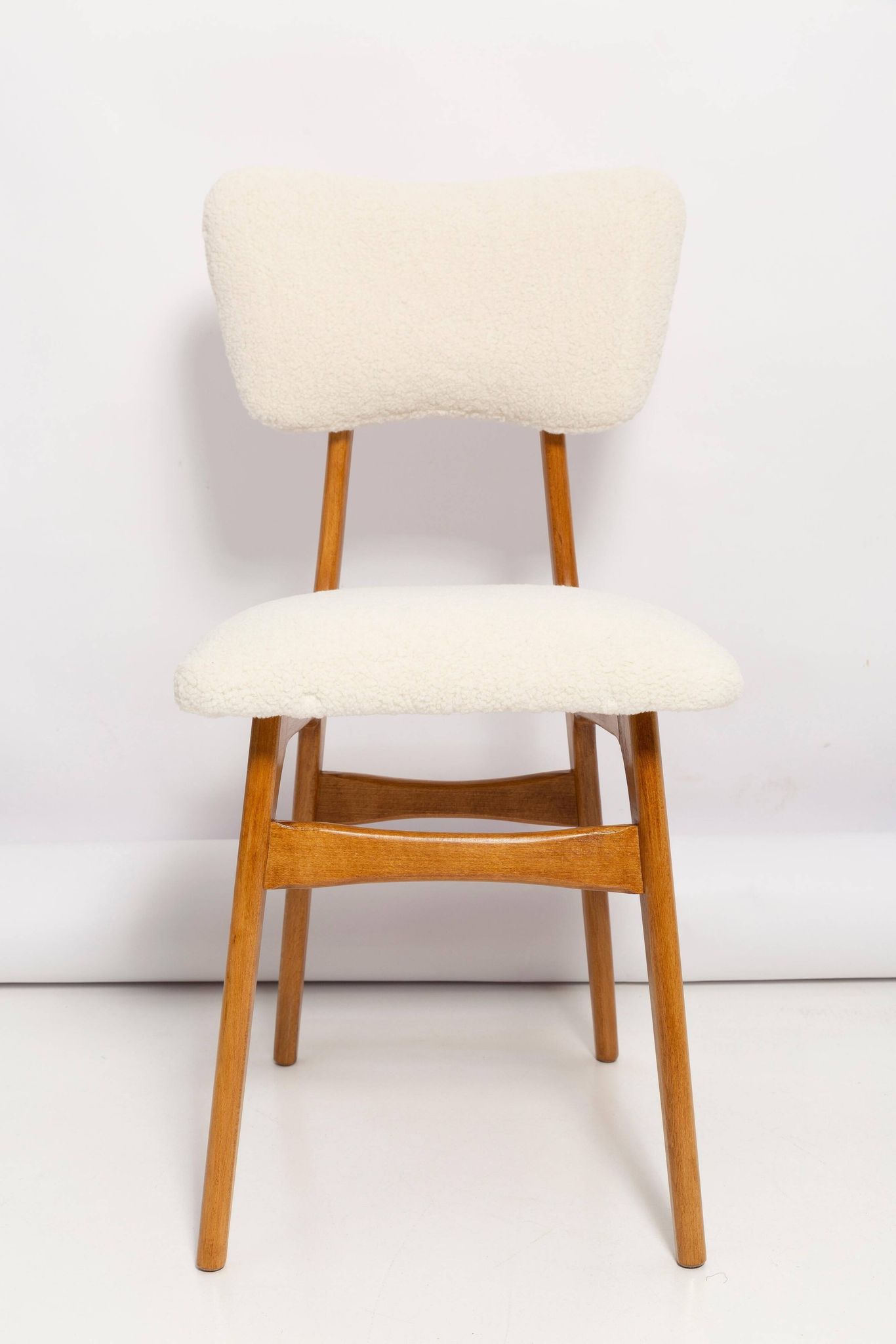 Mid-century "Butterfly" dining chair, light cream boucle, Poland, 1960s