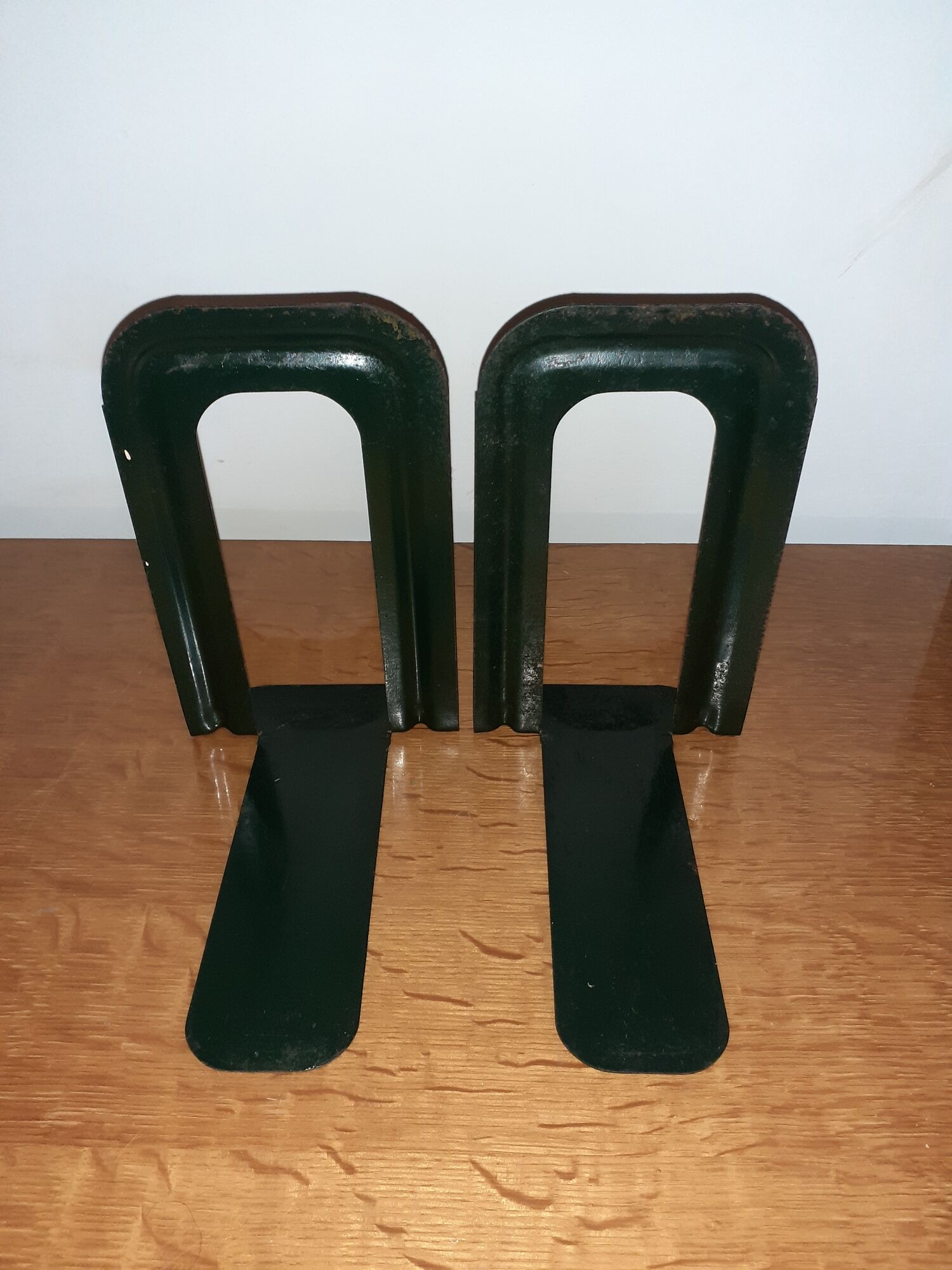 Pair of Ravel Clamart book clamp backs industrial sheet metal