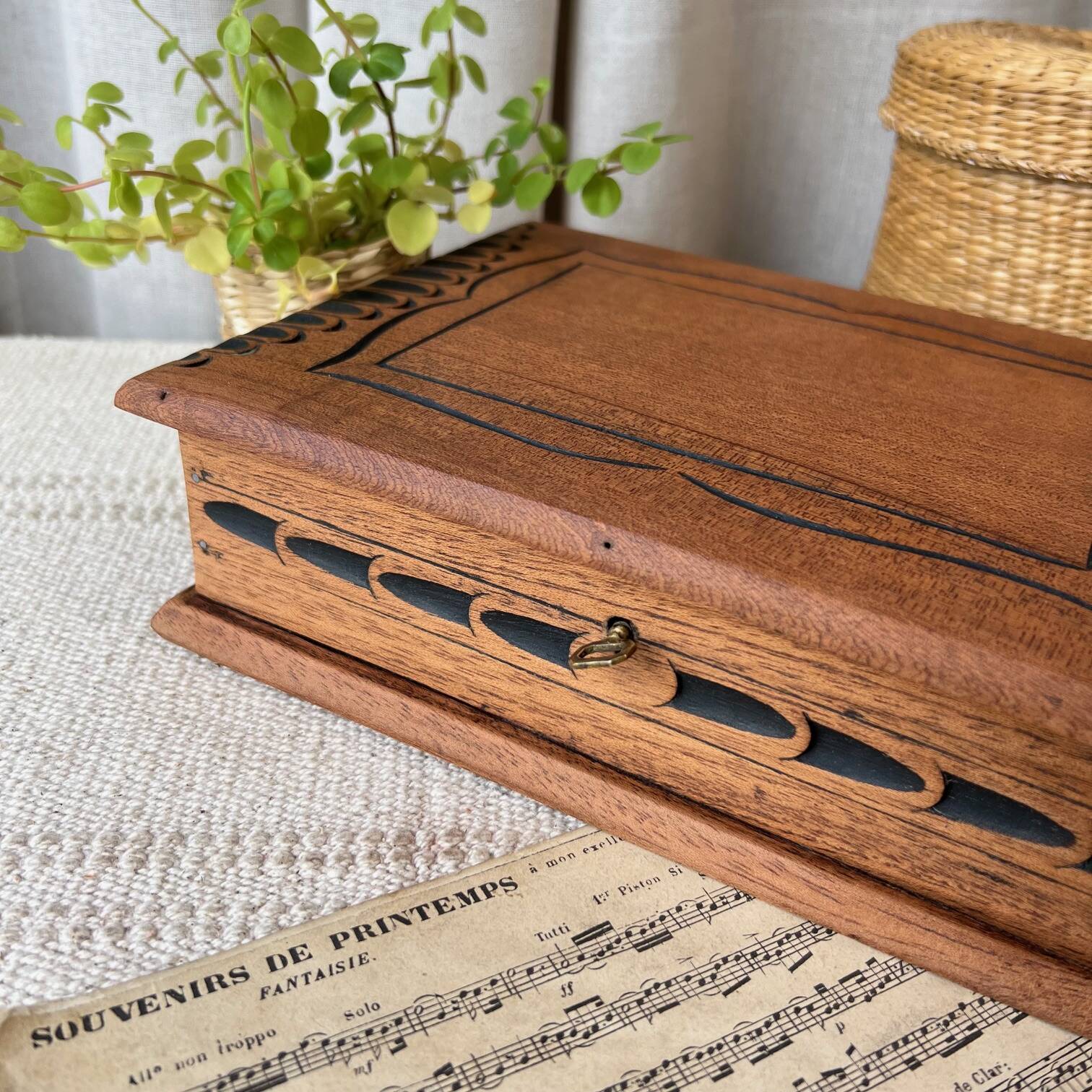 Carved wooden box with key