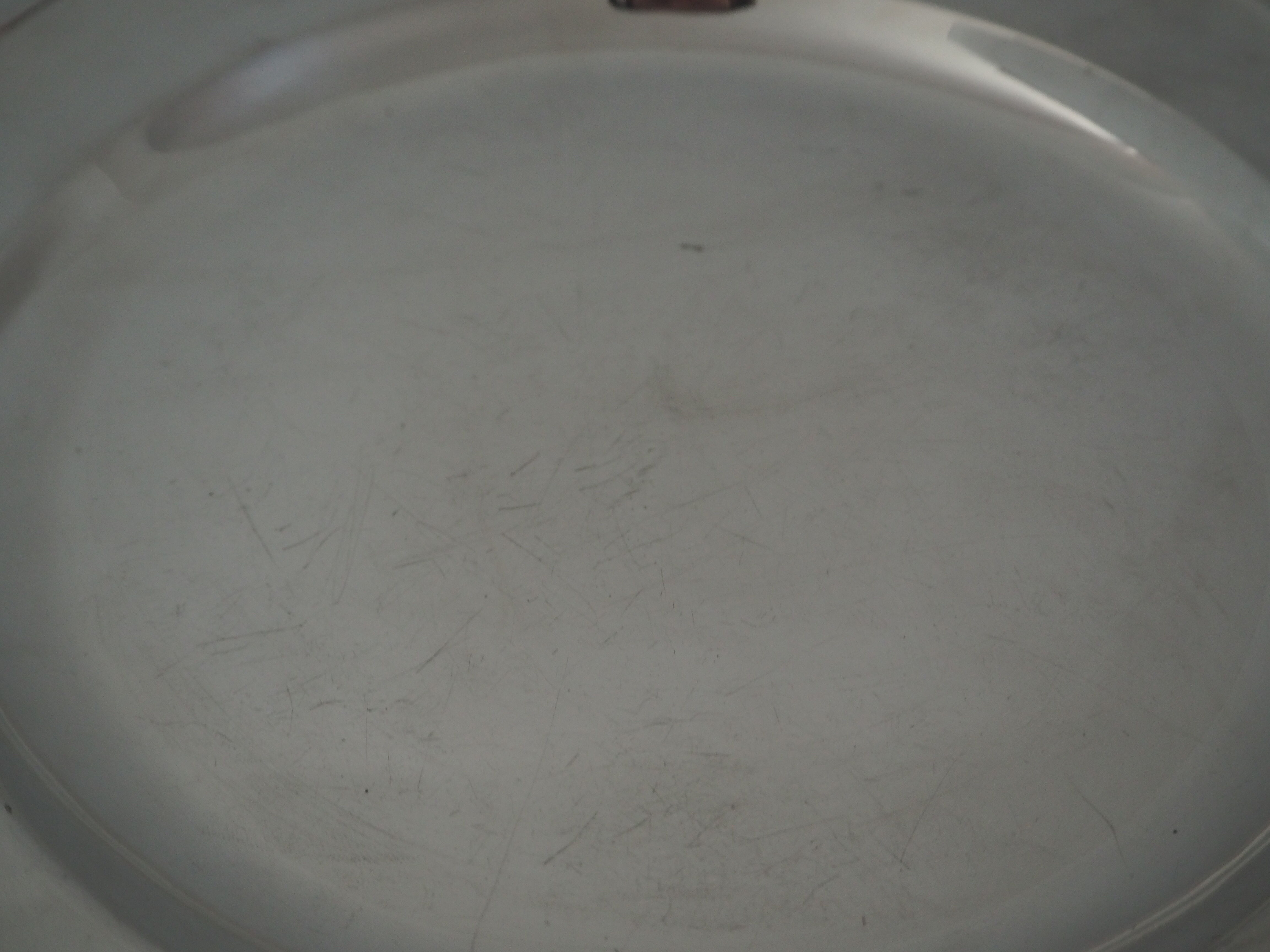 Round silver metal shape dish, punched Christofle