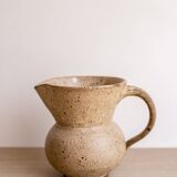 Small pitcher in old speckled stoneware