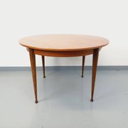 Round dining table in vintage Scandinavian style from the 50s and 60s in teak.