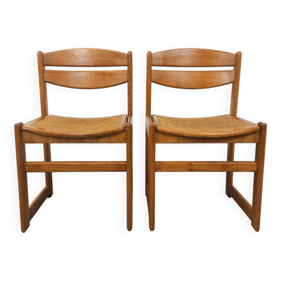 Paire de chaises traîneau vintage en bois de hêtre et cannage des années 70