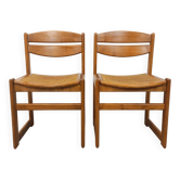Paire de chaises traîneau vintage en bois de hêtre et cannage des années 70