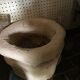 Ancient stone holy water font